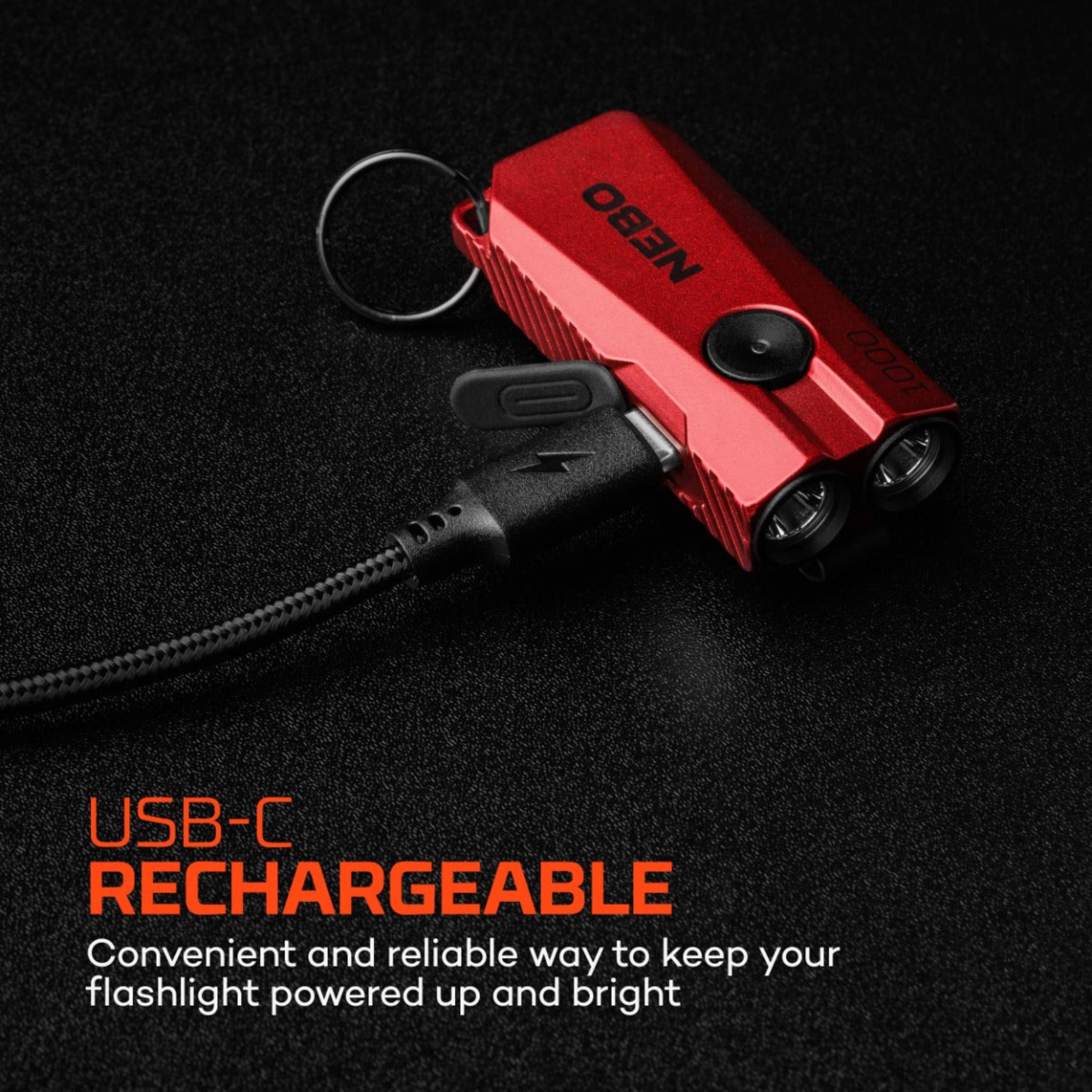 Red Nebo ECD pocket flashlight with USB-C cable on a black background